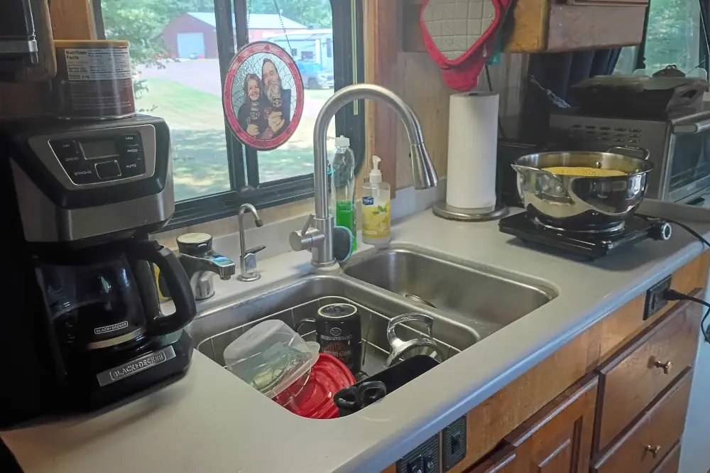 Our RV kitchen where we cook and eat well on the road