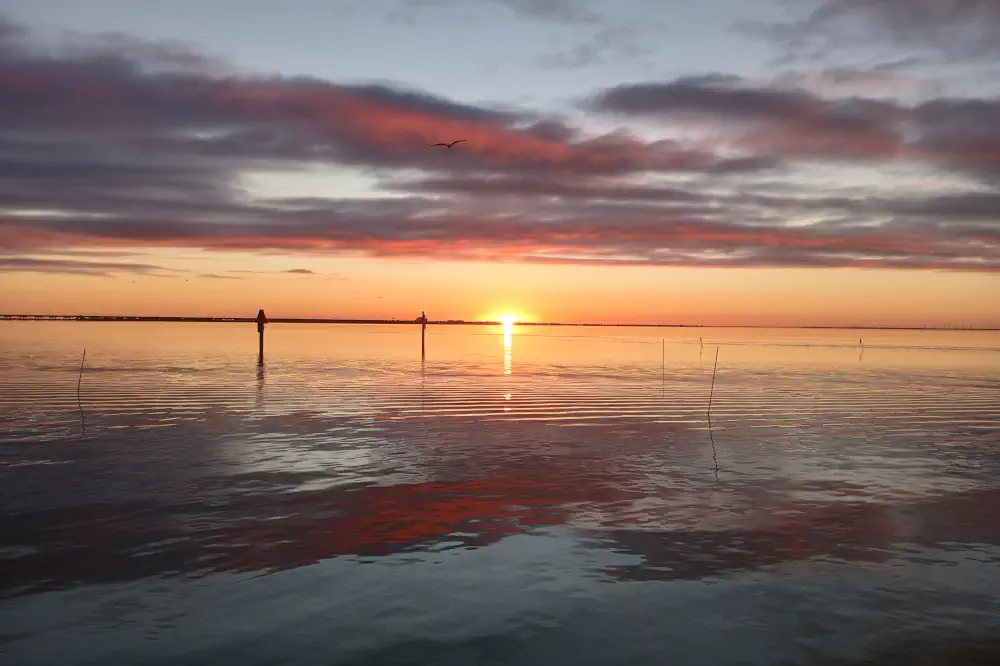 Sunset over the Laguna Madre bay on the bay side of South Padre Island
